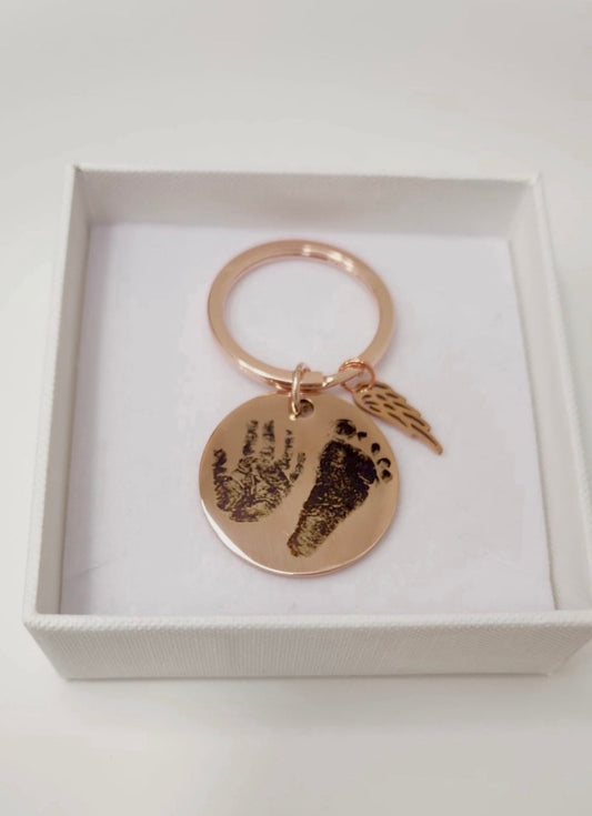 Rose Gold Circle Keyring With Angel Wing Charm