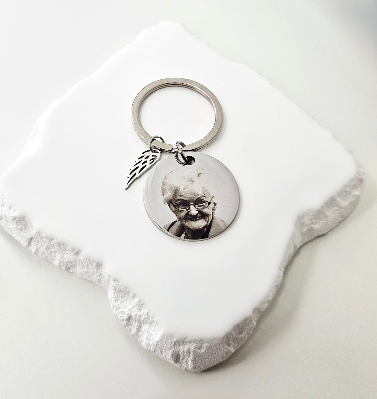 Silver Circle keyring With Angel Wing Charm