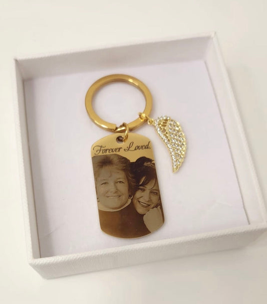 Medium Gold keyring With Angel Wing Charm.