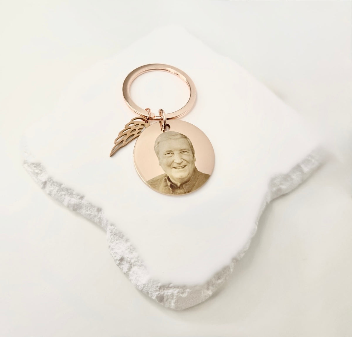 Rose Gold Circle Keyring With Angel Wing Charm