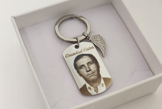 Medium silver keyring With Angel Wing Charm.